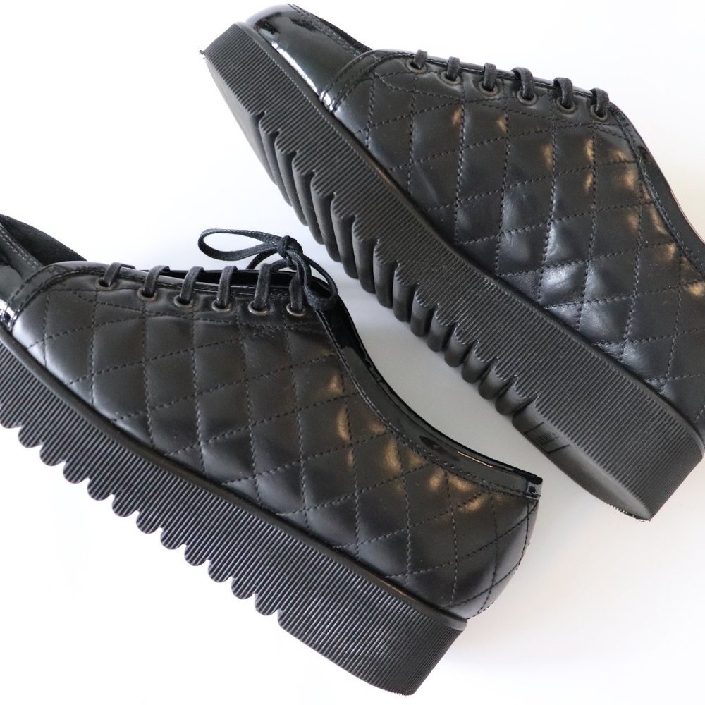 black leather sneakers